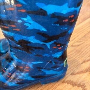 Toddler boys light up rain boots.